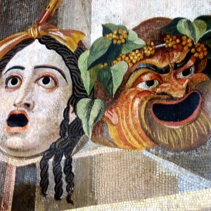 Roman artwork of theatrical masks of tradegy and comedy,  2nd Century BC
